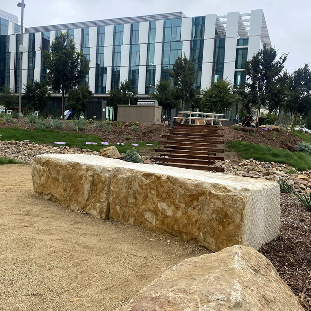 Ecru Bench Boulders installed at college campus courtyard